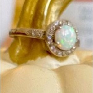 Silver ring with CZs and faux opal.